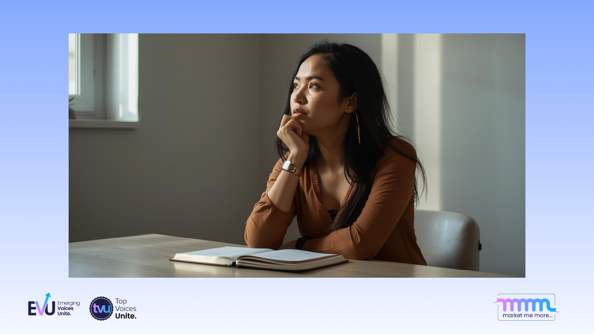 Reflective leader pausing in quiet workspace